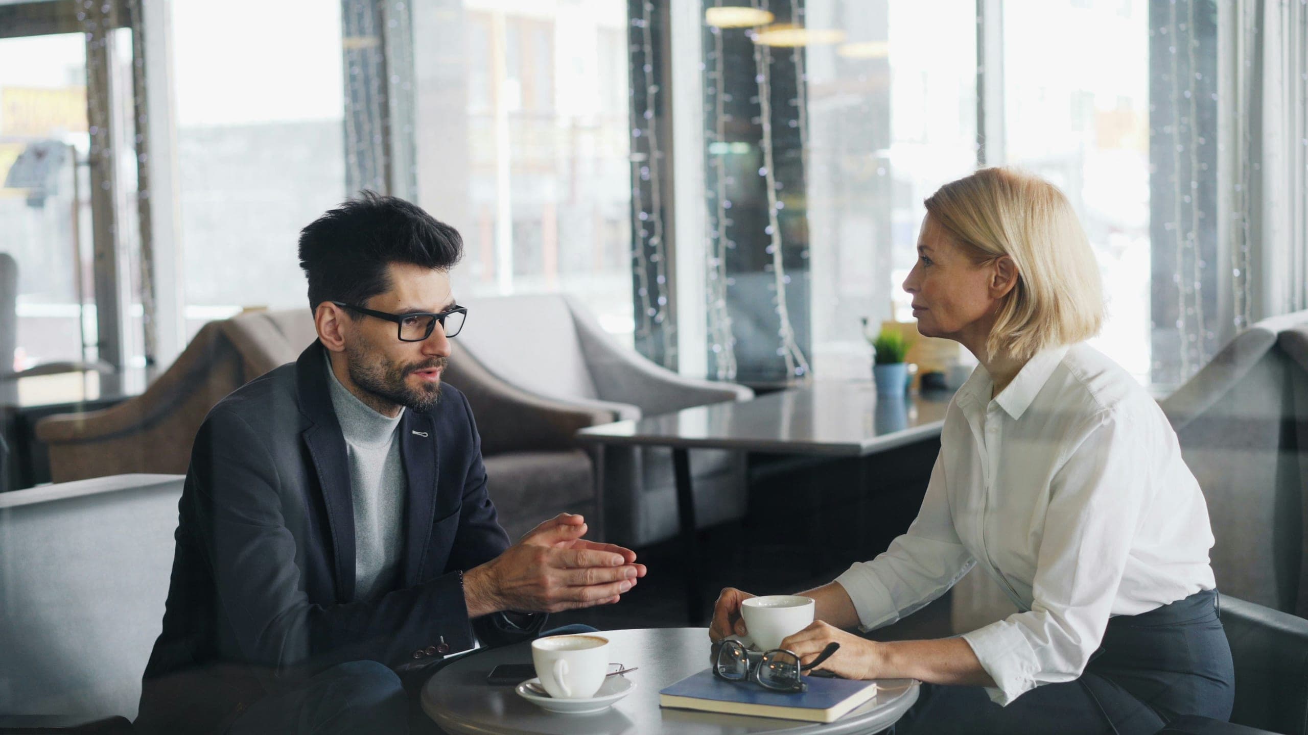 A recruitment consultant in conversation with a legal professional